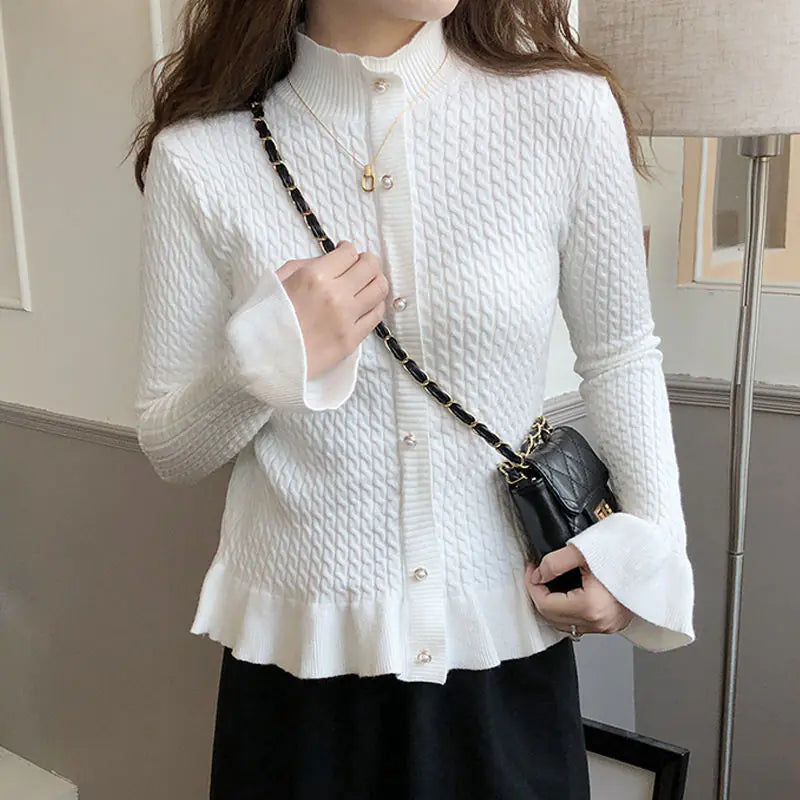 The Tessa Peplum Cardigan