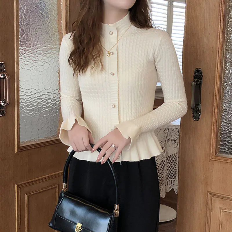 The Tessa Peplum Cardigan